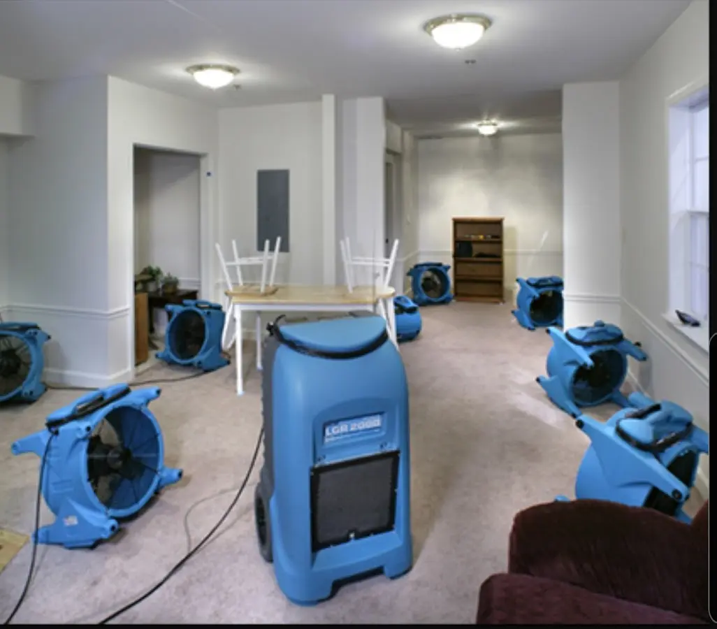 Air movers and dehumidifier setup for Water Damage Restoration in Quantico Base
