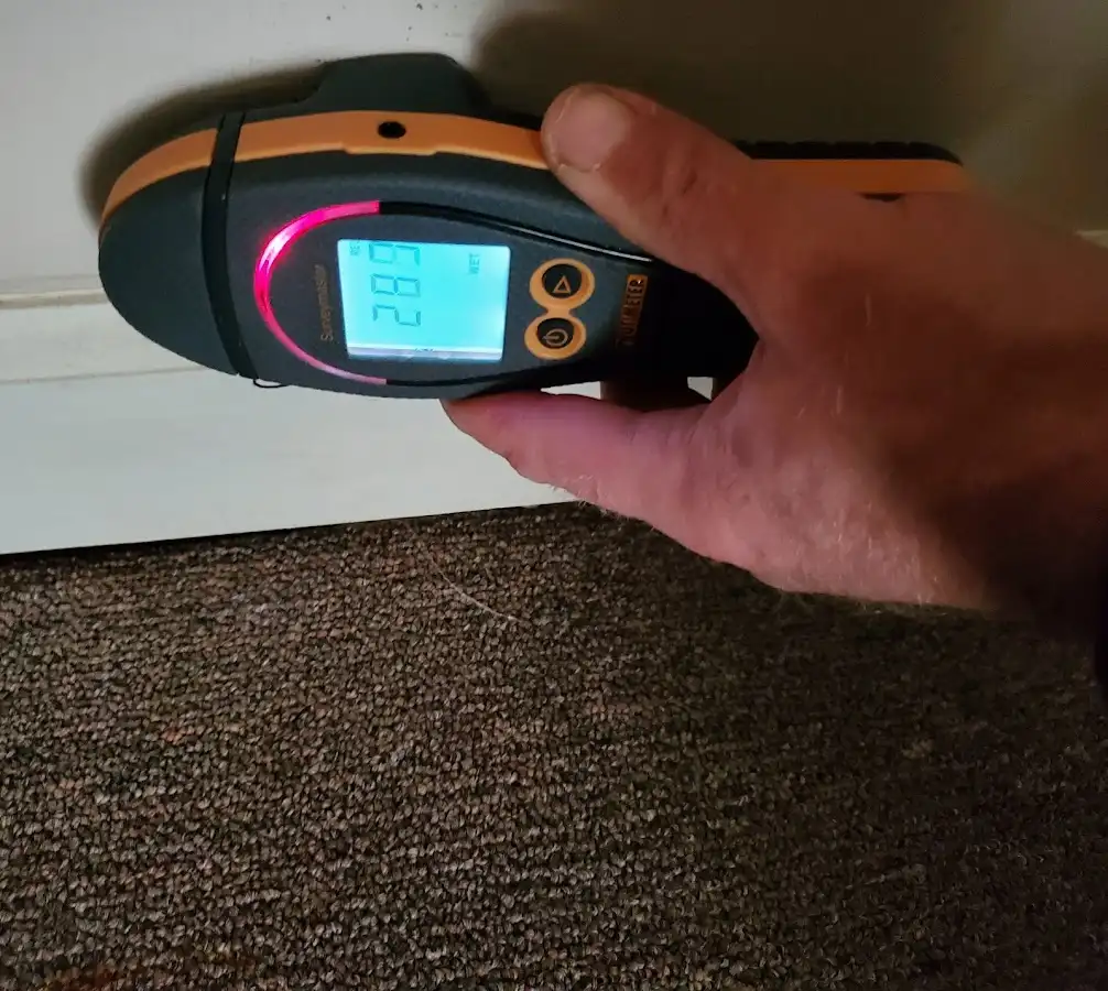 Moisture detection at baseboard during Sewage Cleanup & Sanitation in Quantico Base